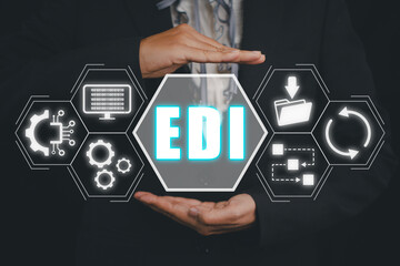EDI, Electronic data interchange concept, Person hand holding Electronic data interchange icon on virtual screen. - obrazy, fototapety, plakaty