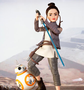 NEW YORK USA: DEC 28 2017: cene depicting Rey discovering the force wielding a lightsaber while training as a Jedi with the droid BB-8 - Hasbro Forces of Destiny action figure