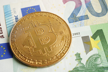 Golden bitcoin on Euro banknotes money for business and commercial, Digital currency, Virtual cryptocurrency.