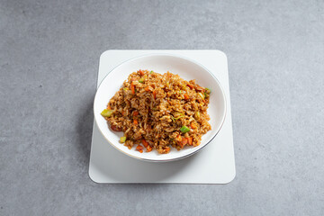 Sausage vegetable fried rice on plate