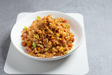 Sausage vegetable fried rice on plate
