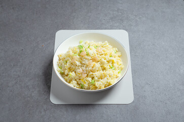 Shrimp and egg fried rice on a plate