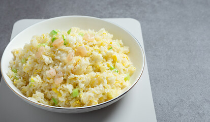 Shrimp and egg fried rice on a plate