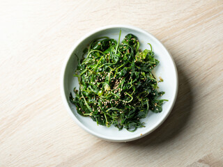 Seasoned greens on a plate, side dish