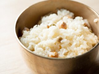Well-cooked steamed rice in a brass bowl