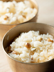 Well-cooked steamed rice in a brass bowl