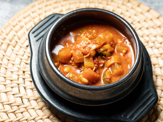 Soybean paste stew in an earthenware bowl, Korean food
