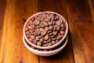 Premium Colombian Coffee Beans on Wooden Plank