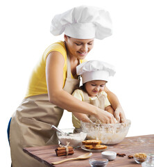 Happy loving mother and child cooking are preparing bakery