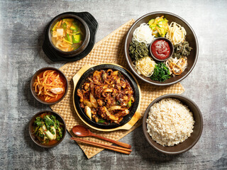 Stir-fried webfoot octopus, various vegetable bibimbap, and soybean paste stew