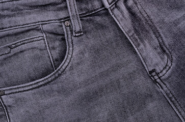 Gray denim background.