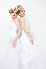 brides in white dresses