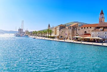 Obraz premium Trogir town panoramic view. UNESCO world heritage site panoramic view in Dalmatia, Croatia, tourist destination. View of sea coast in Trogir town with colorful houses