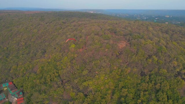 parachute raide in chapora beach in goa india Sandy Beach Sweet Lake goa