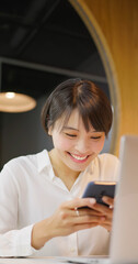 asian happy businesswoman working