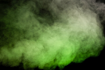 Green and white steam on a black background.