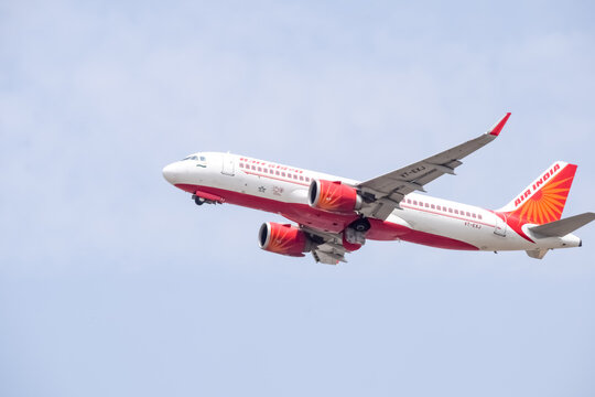 New Delhi, India, April 16 2023 - Air India Airbus A320 take off from Indra Gandhi International Airport Delhi, Air India domestic aeroplane flying in the blue sky during day time