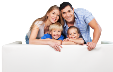 Beautiful smiling family in a room on couch