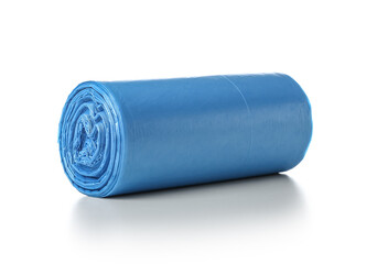 Blue roll of garbage bags on white background