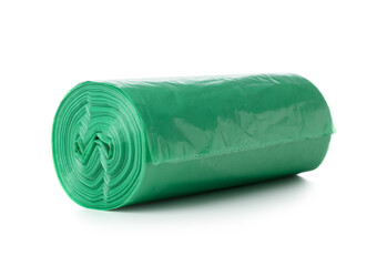 Green roll of garbage bags on white background