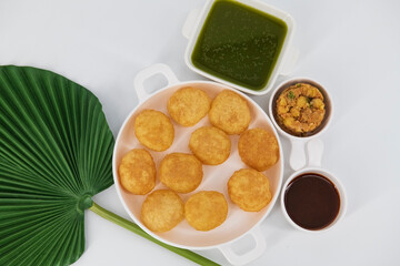 Desi Indian Street Food called Golgappe or Pani Puri.Famous Indian starter snack. Pani puri chaat,...