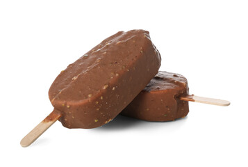 Delicious chocolate covered ice cream on stick against white background