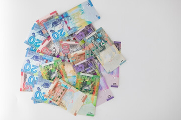 Selective focused , Full set of Kuwaiti Dinar bank paper notes. Kuwait dinar bank notes 0.25KWD, 0.5KWD, 1KWD, 5KWD, 10 KWD and 20 KWD. Kid trying to take the Kuwait dinar bank notes