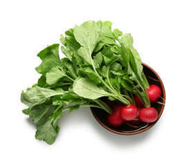 Bowl of ripe radish with green leaves on white background