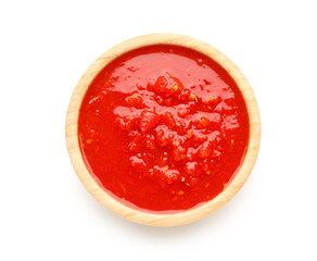 Bowl with tasty tomato sauce on white background