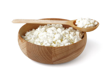 Bowl and spoon with tasty cottage cheese on white background