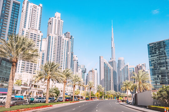 Scenic view of street road with skyscrapers buildings and famous Burj Khalifa in the background