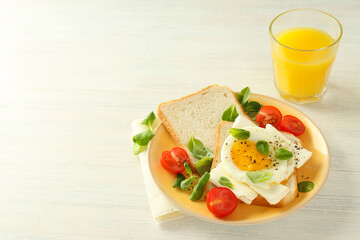 Concept of tasty breakfast with sandwich, space for trex