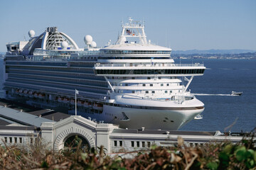 Mega cruiseship cruise ship luxury liner Ruby in port of San Francisco Bay, California at terminal...