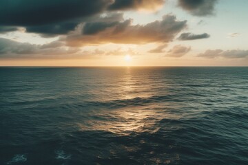 Naklejka na ściany i meble Sunrise over the ocean with panoramic view of the sea and clouds. Generative AI