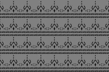 Motif grey ethnic Ikat art. Ethnic seamless pattern. Aztec geometric art ornament print. American, Mexican style. Design for background, wallpaper, fabric, clothing, carpet, batik, embroidery.