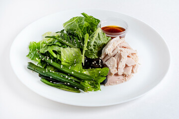 chicken with green lettuce salad