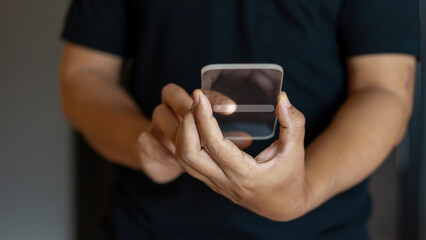 Man clicking internet search page browsing internet data information networking on smartphone.