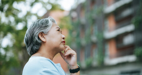 Portrait of thoughtful mature woman anxiety appeared on face