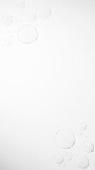 白い背景に無色透明の水。水滴。美容液。（縦長）