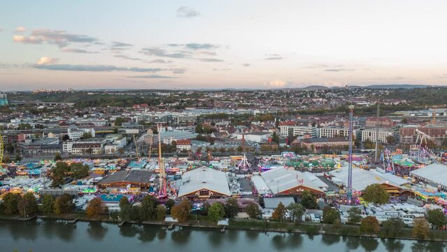 Time lapse amusement park along river, Wasen District, Stuttgart, Germany
