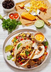 Beef Steak Tacos with veggies, avocado, corn