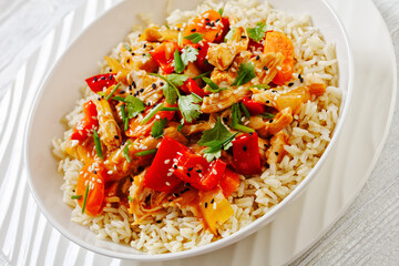 sweet and sour chicken with veggies and rice