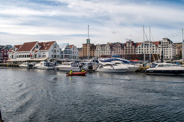 Fototapeta na wymiar Bergen, Norway - The harbor embankment with historic Bryggen wooden houses in the center of the city.