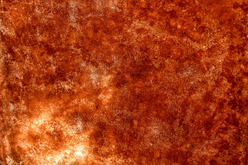 Copper background. An old rusty metal panel.