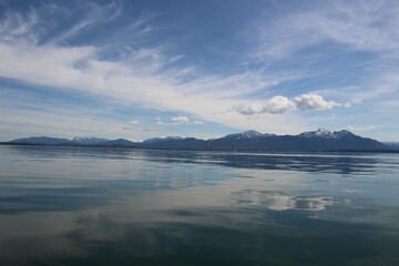 idylic lake in Bavaria with mountains in the background