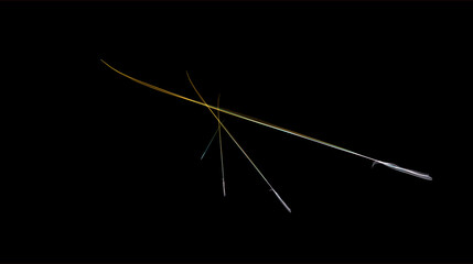 A black background with bright colored light beams, web design.