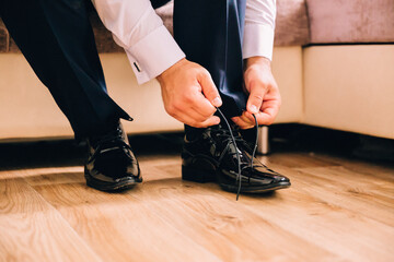 person putting on shoes