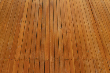 Natural wood slats wall or lath line arrange. Flooring pattern surface texture. Close-up of interior architecture material for design decoration background.