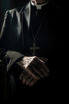 Concept of child abuse in church: hands of a priest