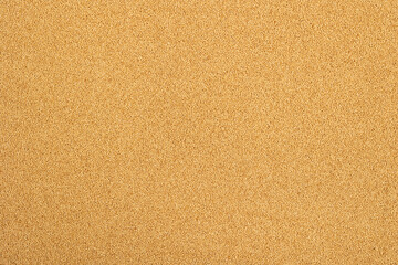 Amaranth grains texture. Beige background.